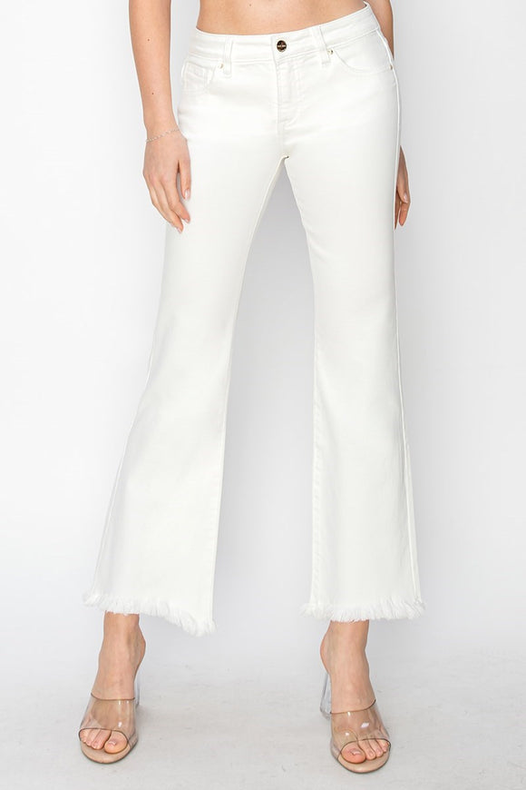Risen white low rise hem jeans